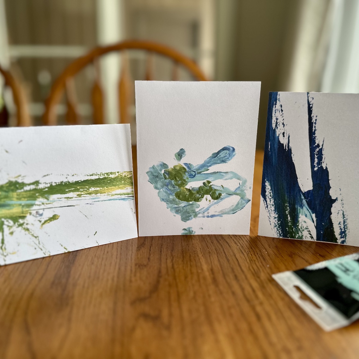 Greeting card made by a 2-year-old with blue paint